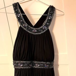 Long navy dress with beautiful beaded back and front.